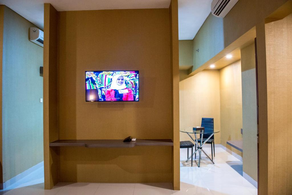 TV a/nebo společenská místnost v ubytování Grand Padis Hotel