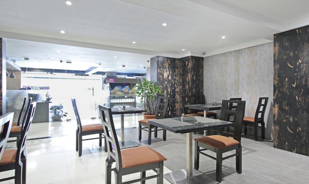 Kuchyň nebo kuchyňský kout v ubytování Itsy Hotels Jansi Residency