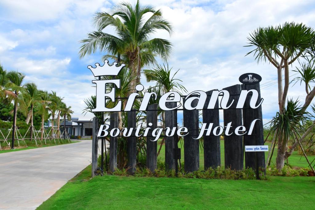 a sign for the entrance to a boutique hotel at Eireann Boutique Hotel in Prakhon Chai