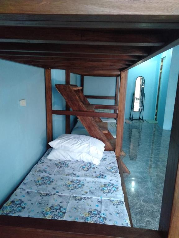 Postel nebo postele na pokoji v ubytování Carillo guest house