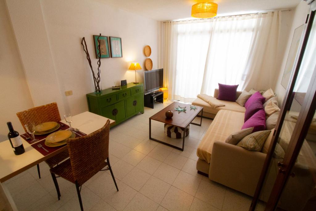 Posezení v ubytování MEDANO4YOU Red Square Dream Holiday Home