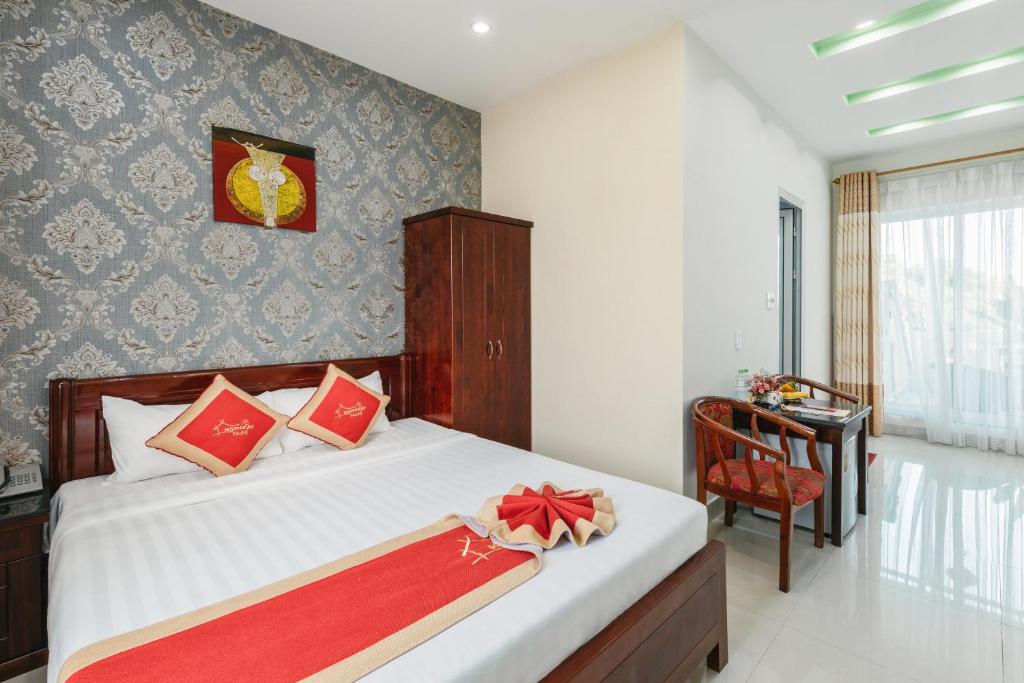Postel nebo postele na pokoji v ubytování Nu Ni Homestay