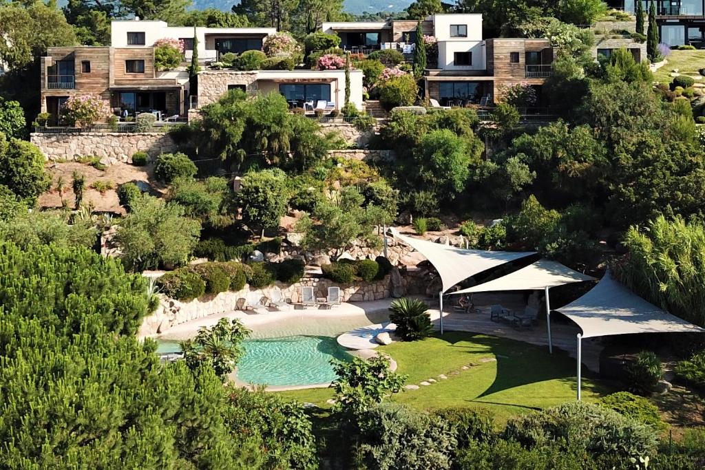 an aerial view of a house with a swimming pool at Résidence Affasciata in Porto-Vecchio