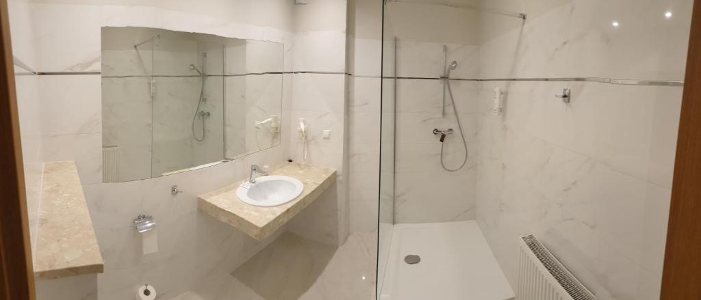 Kúpeľňa v ubytovaní Hotel Kamiza