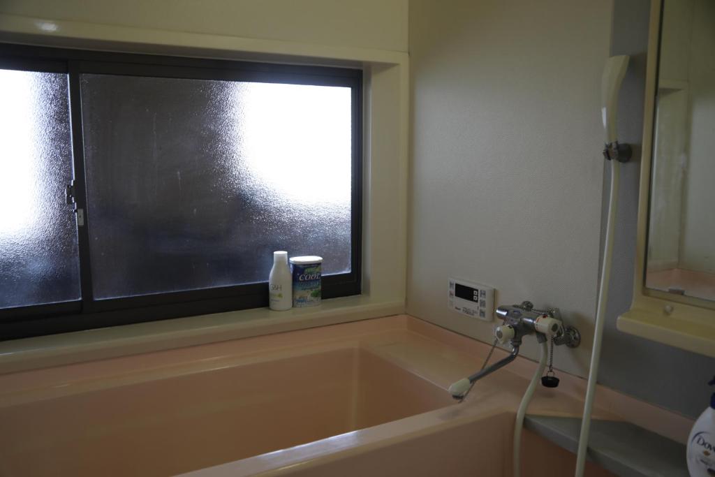 Koupelna v ubytování Guesthouse Omihachiman