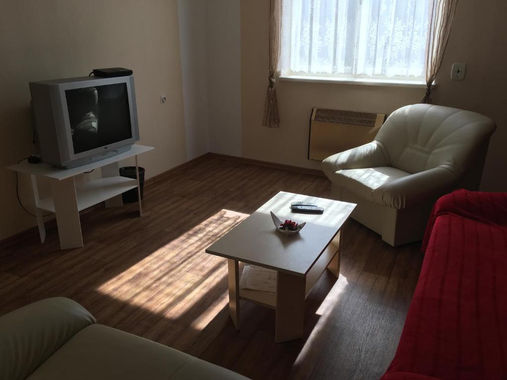 TV a/nebo společenská místnost v ubytování Pension Palla