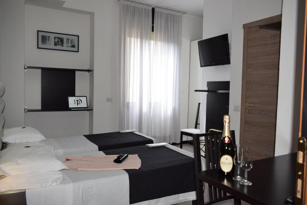 TV a/nebo společenská místnost v ubytování Hotel Perugino