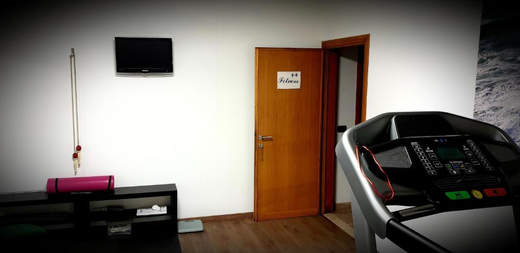 TV a/nebo společenská místnost v ubytování B&b Igea 50