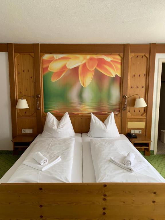Giường trong phòng chung tại Hotel Gasthof Stift