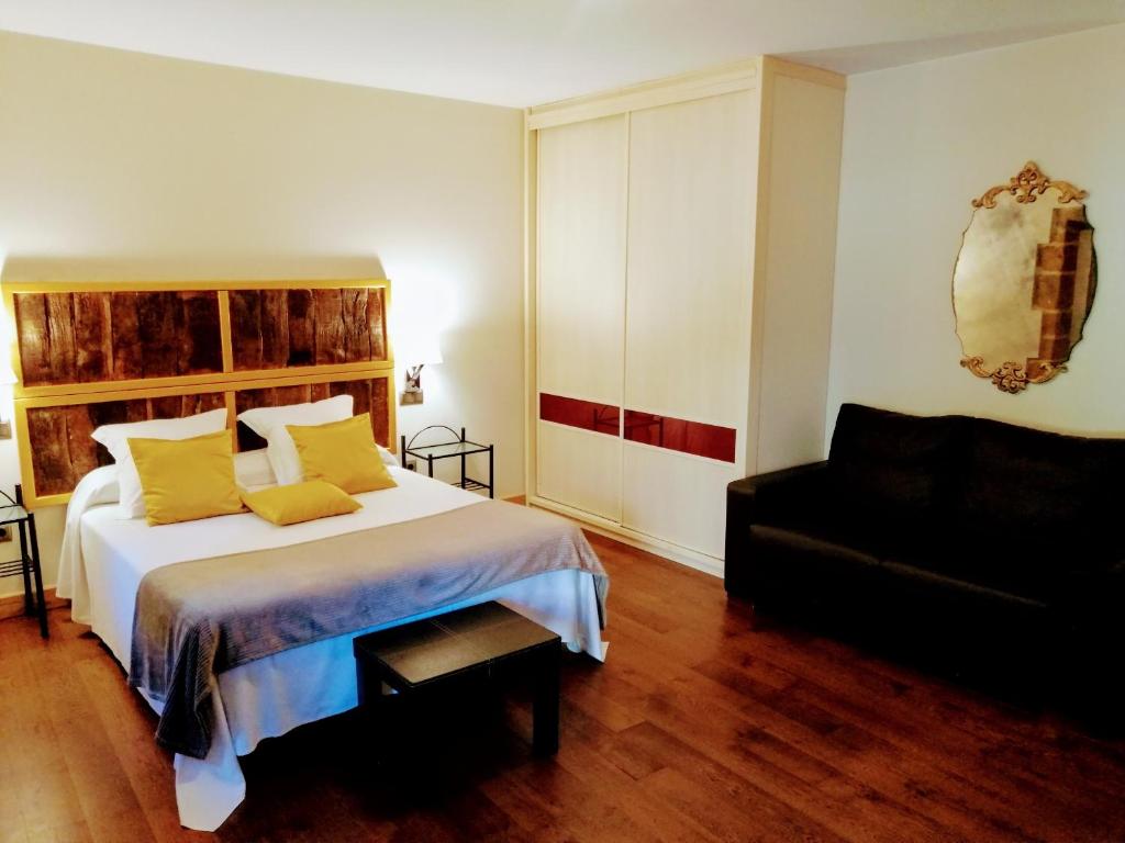 Postel nebo postele na pokoji v ubytování Palacio de Arce