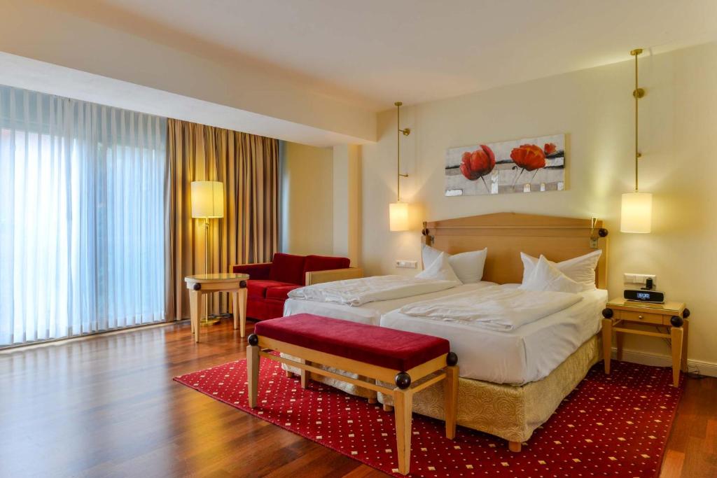 Postel nebo postele na pokoji v ubytování Hotel Pöker
