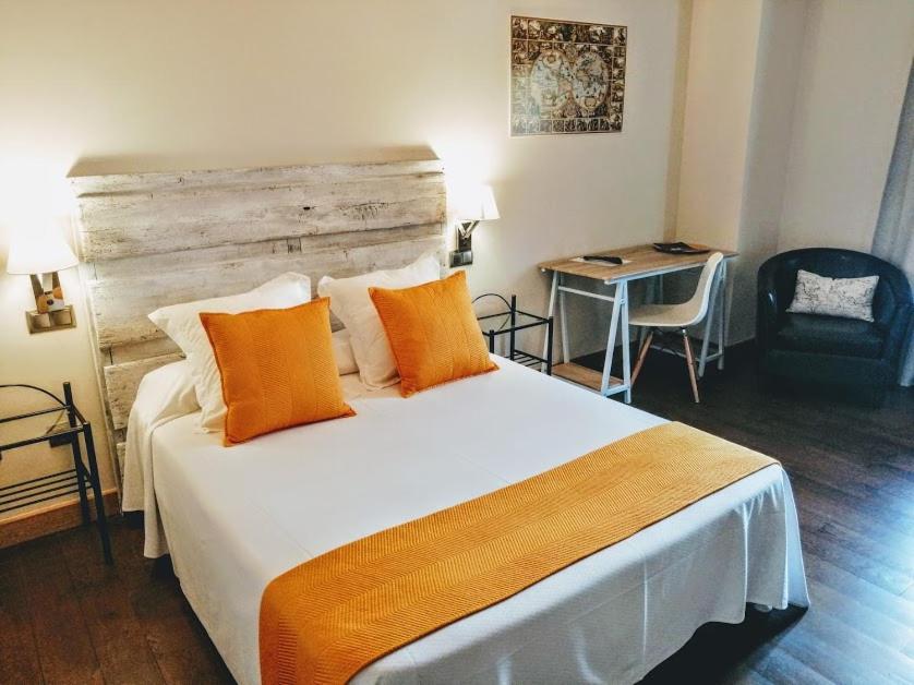 Postel nebo postele na pokoji v ubytování Palacio de Arce