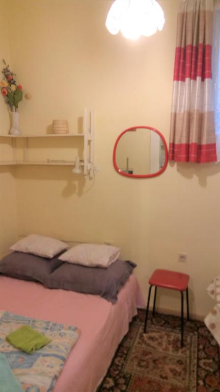 Postel nebo postele na pokoji v ubytování Garibaldi 5 Apartments & Rooms
