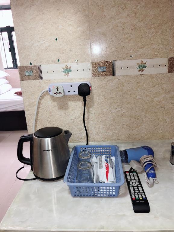 Kuchyň nebo kuchyňský kout v ubytování Hung Fai Guest House