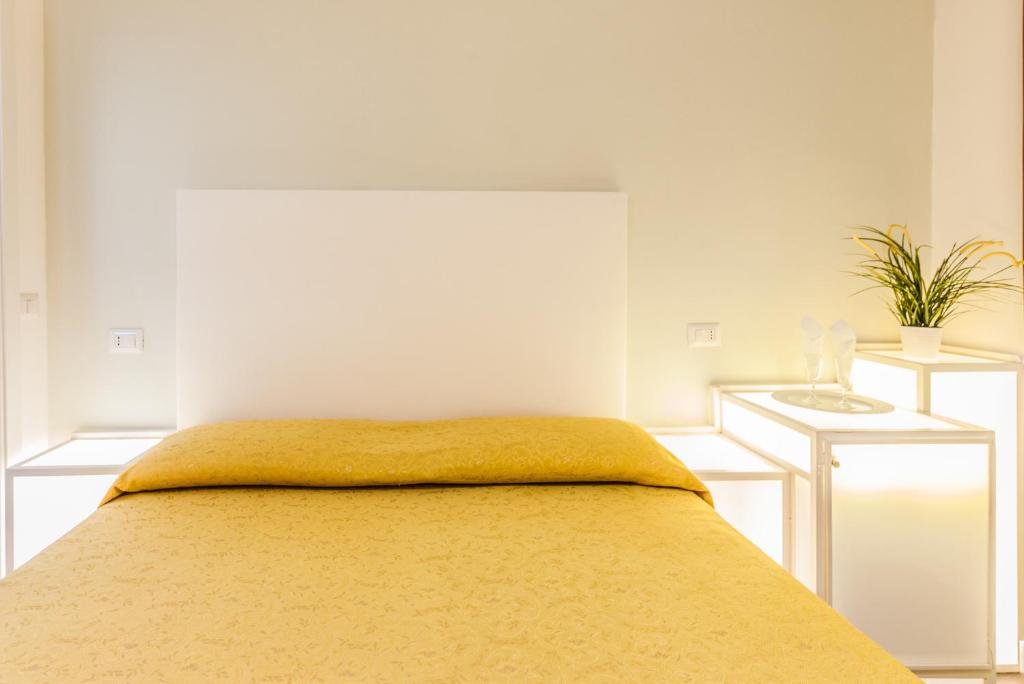 Postel nebo postele na pokoji v ubytování Albergo Della Corte