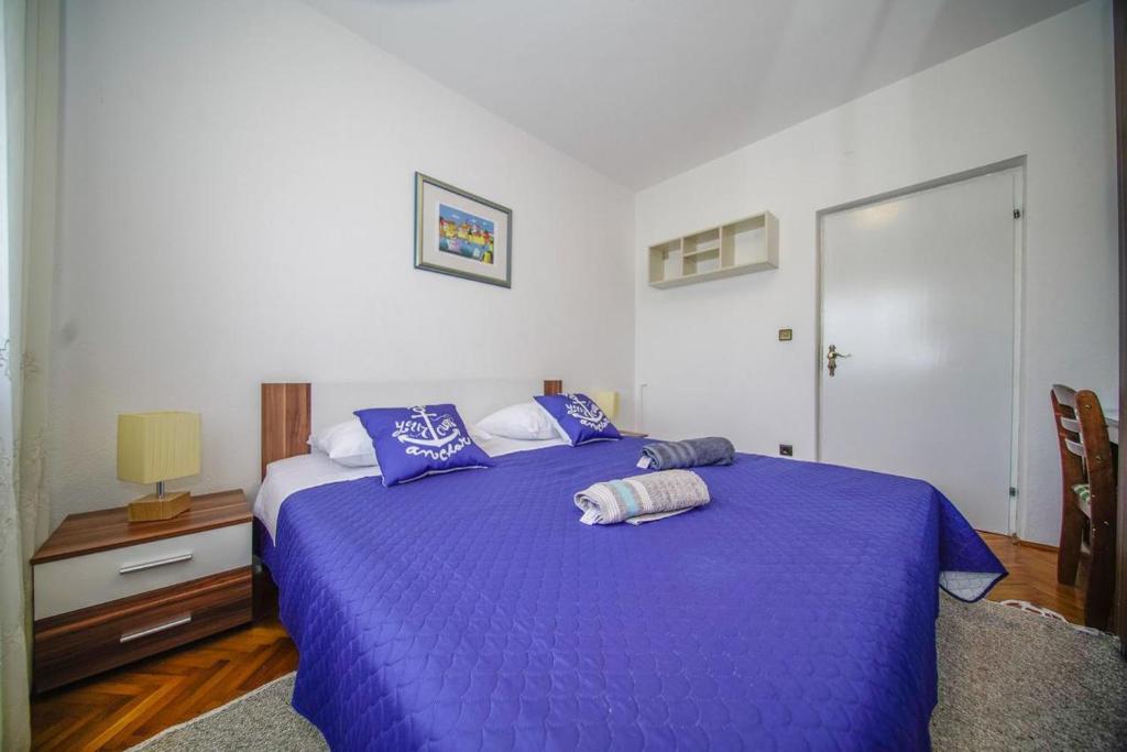 Postel nebo postele na pokoji v ubytování Apartman Mate