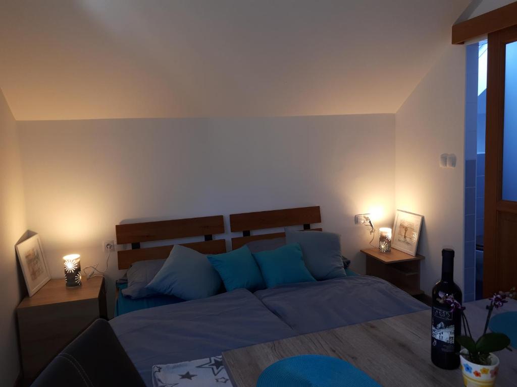 Postel nebo postele na pokoji v ubytování Apartmaji Daniel