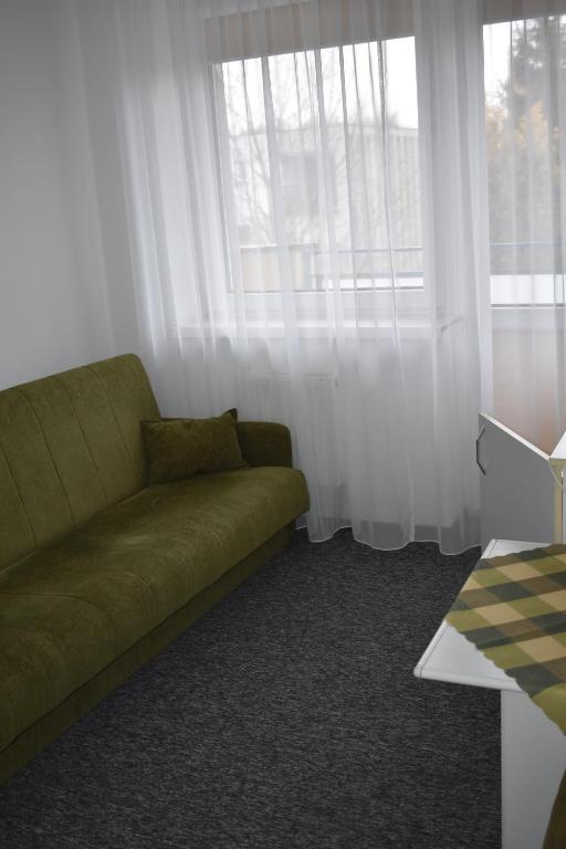 Posezení v ubytování Ośrodek Wypoczynkowy Ania Dźwirzyno
