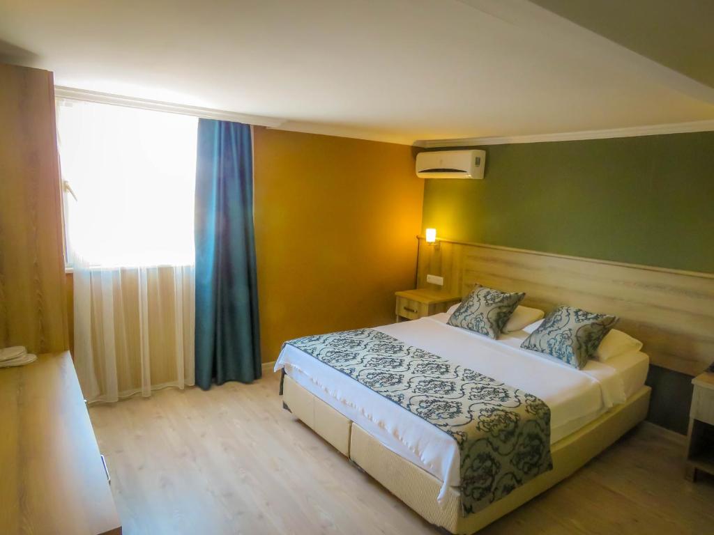 Postel nebo postele na pokoji v ubytování Remer Hotel