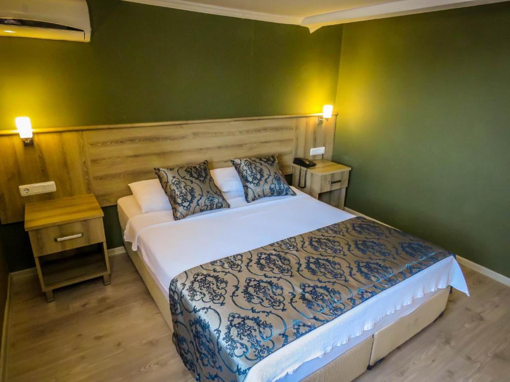 Postel nebo postele na pokoji v ubytování Remer Hotel