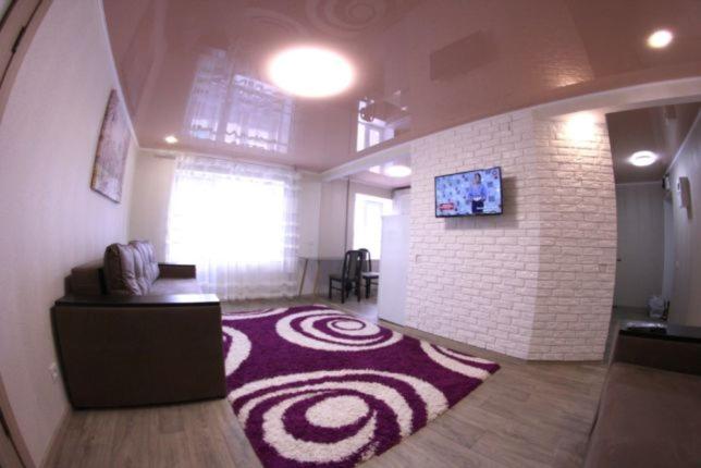 a living room with a rug on the floor at улица Шевченко, 26 Апартаменты in Kropyvnytskyi