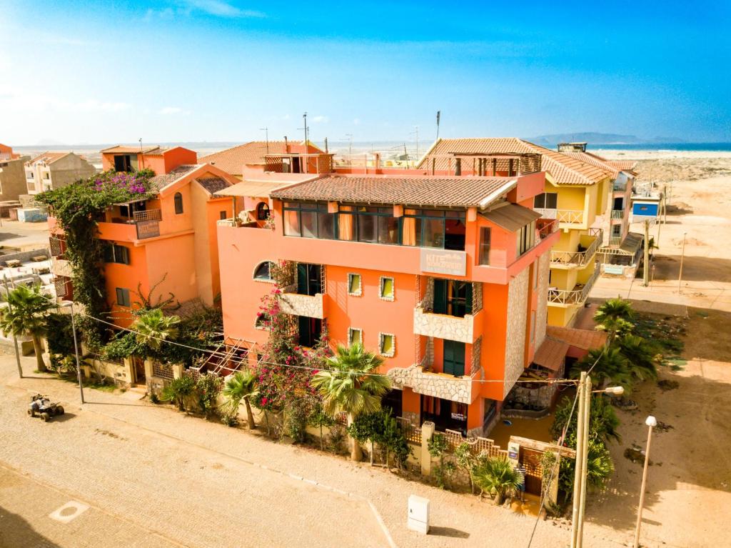 an overhead view of an apartment building in a city at Surfactivity Guest House in Santa Maria