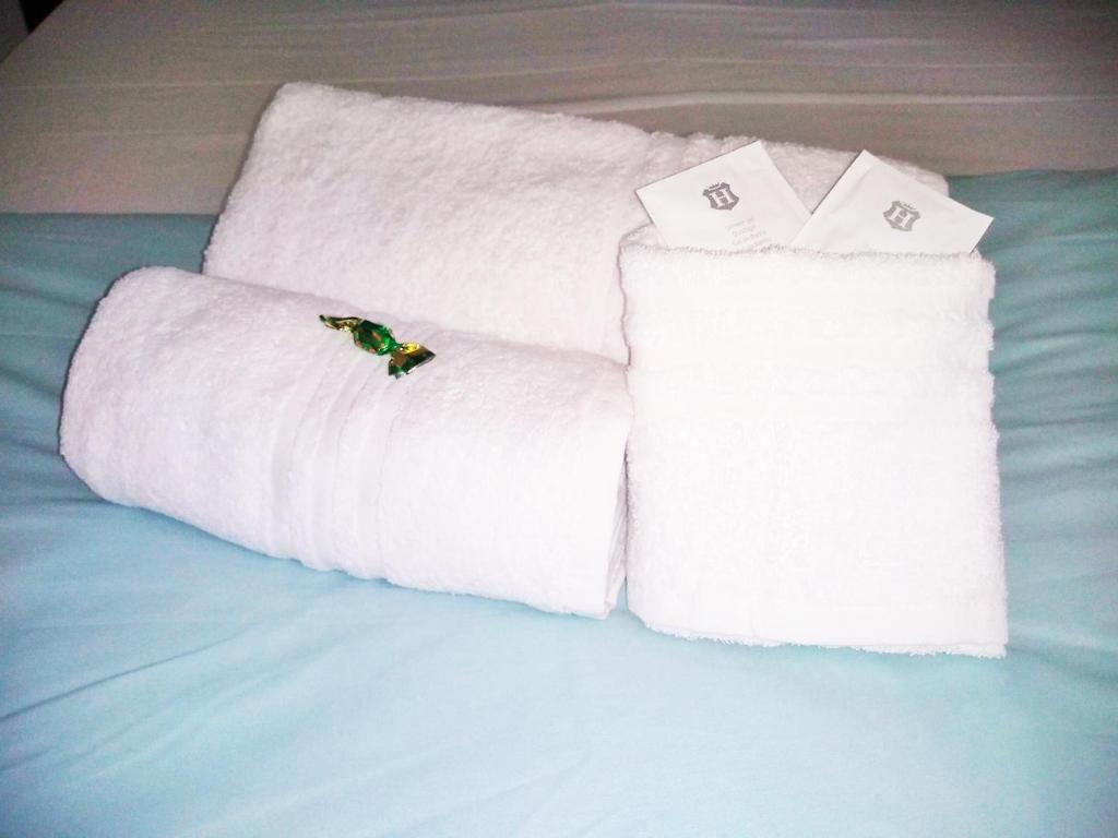 A bed or beds in a room at Casa Italiano - BestBnB Garbatella