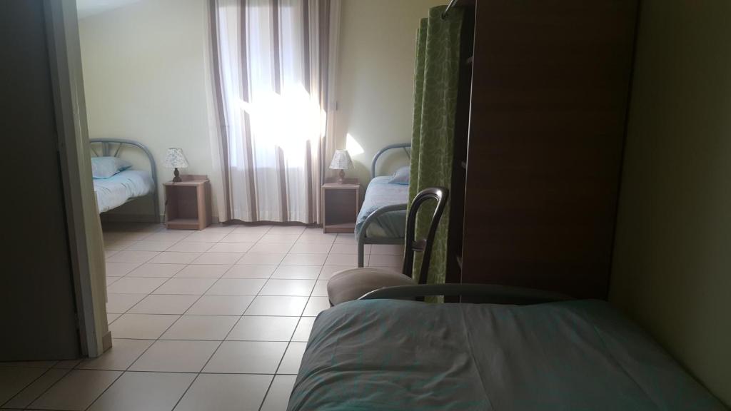 Postel nebo postele na pokoji v ubytování Ferme Ithurburia