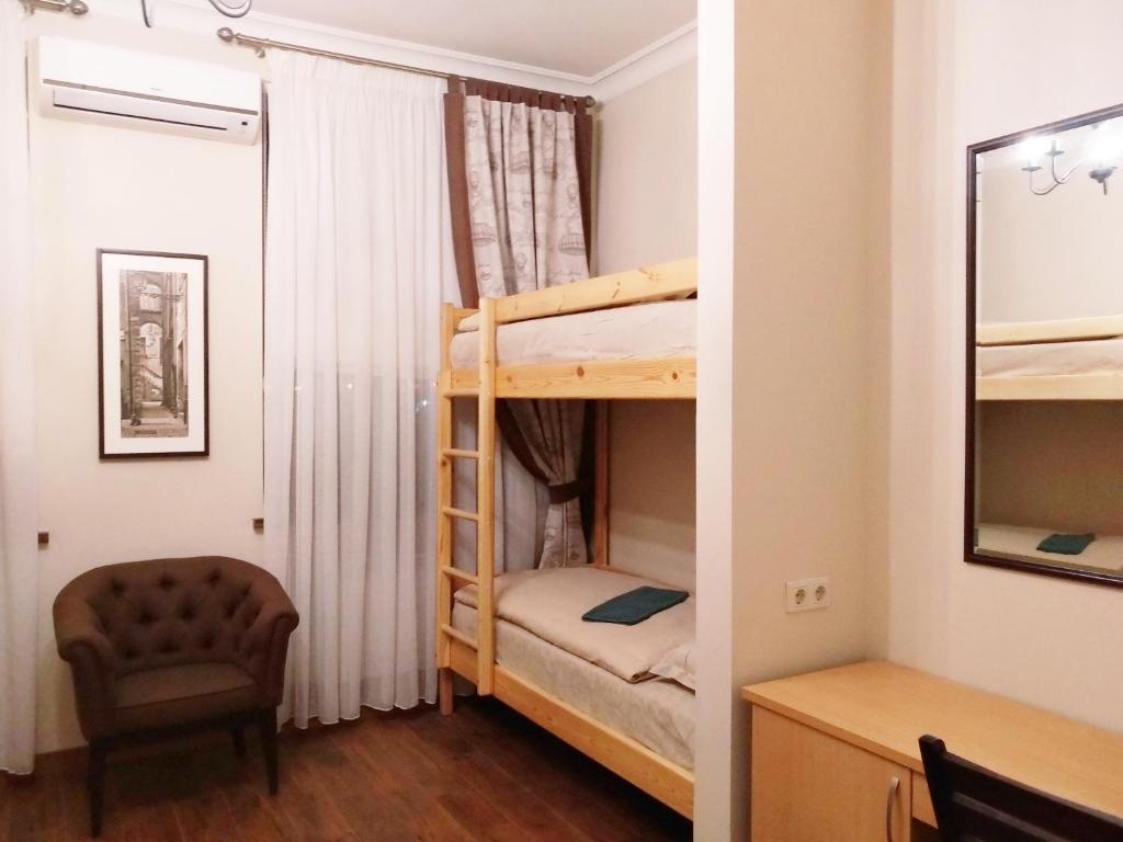 Postel nebo postele na pokoji v ubytování Belokorichi