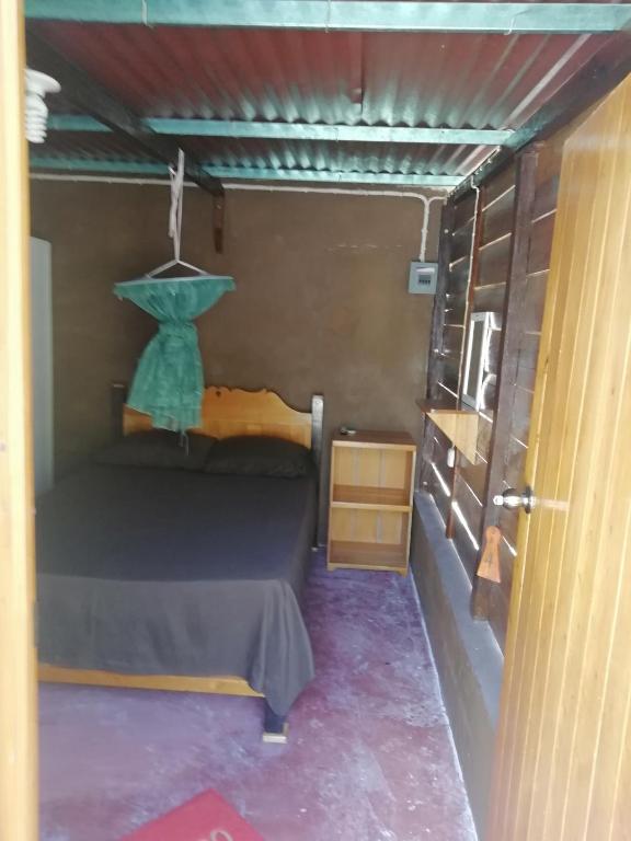 Postel nebo postele na pokoji v ubytování Cabanas chaac calakmul