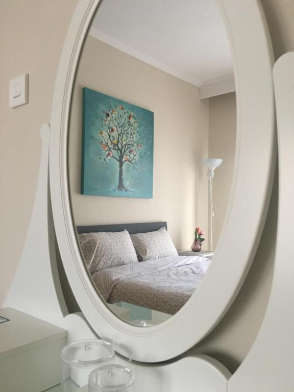 Postel nebo postele na pokoji v ubytování Cozy and Quiet mini City Apartment