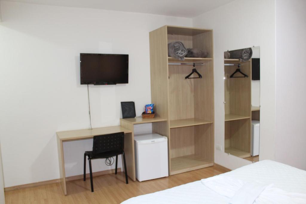 TV a/nebo společenská místnost v ubytování Hotel Dom Thomaz