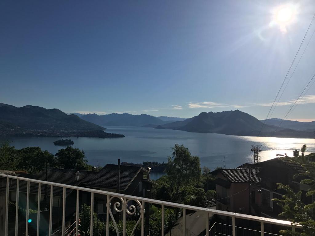 a view of a lake from a balcony at Appartamento VillaGiò - Terrazzo in Stresa