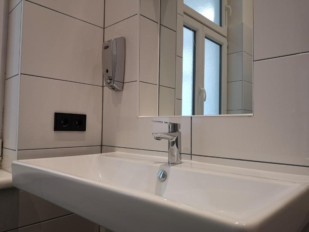 Łazienka w obiekcie Apartment, modern und neu renoviert