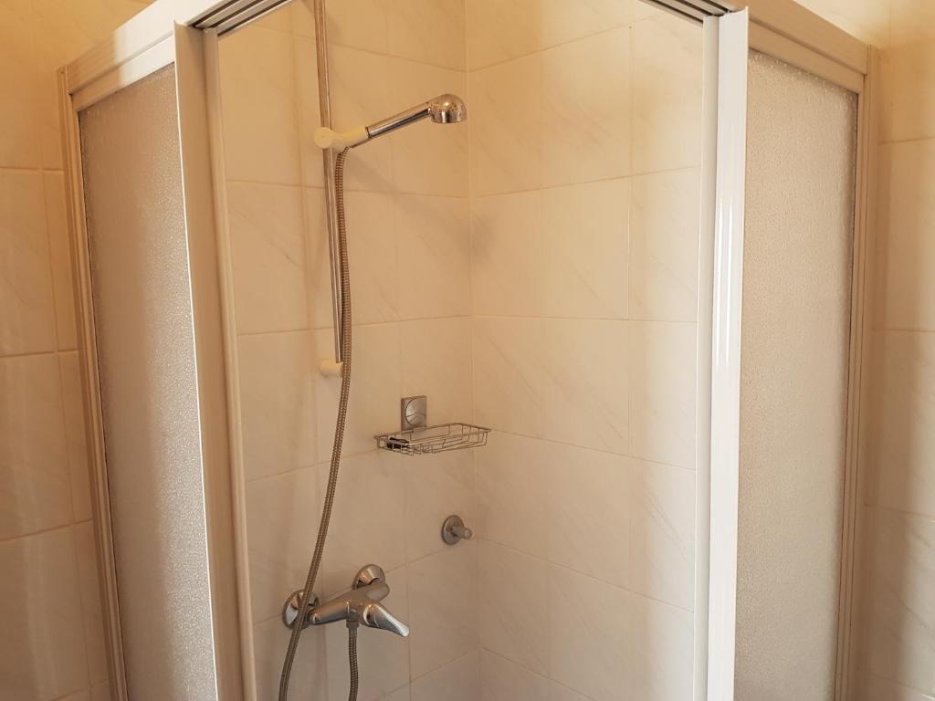 Koupelna v ubytování Apartments Zova