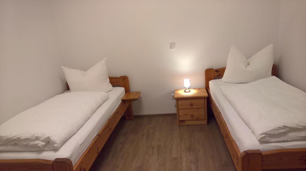 Postel nebo postele na pokoji v ubytování Aparthotel Sebastian