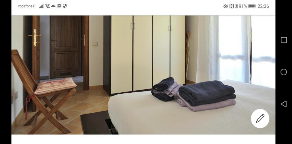 Łóżko lub łóżka w pokoju w obiekcie Casa Alessandra