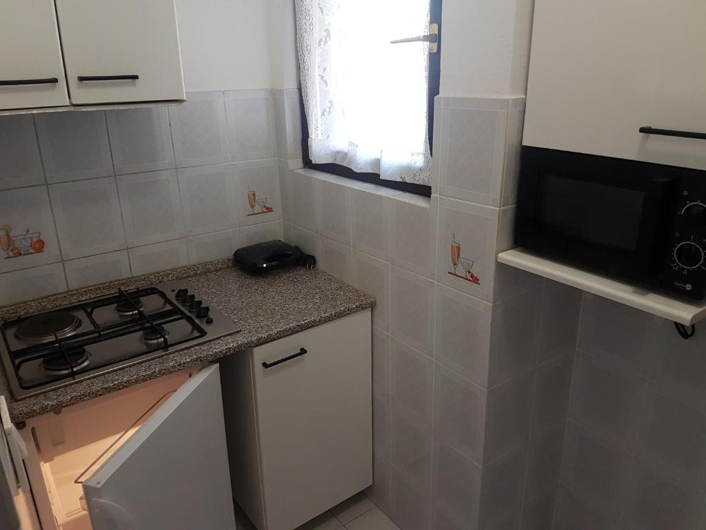 Kuchyň nebo kuchyňský kout v ubytování Apartments Zova