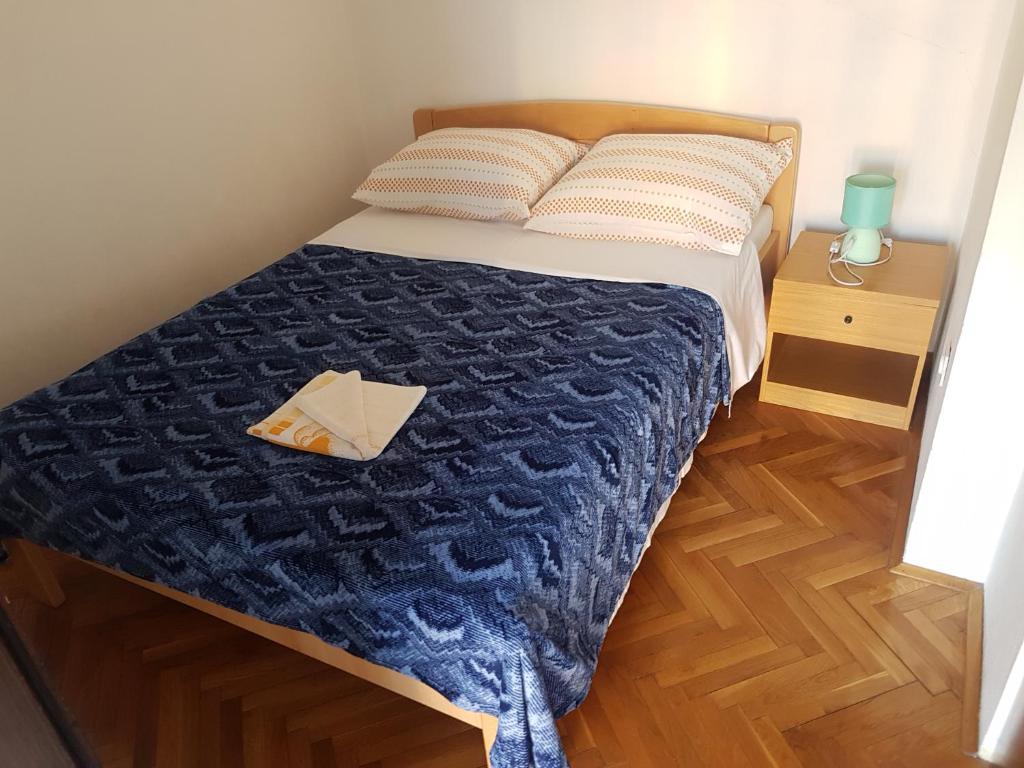 Postel nebo postele na pokoji v ubytování Apartments Zova