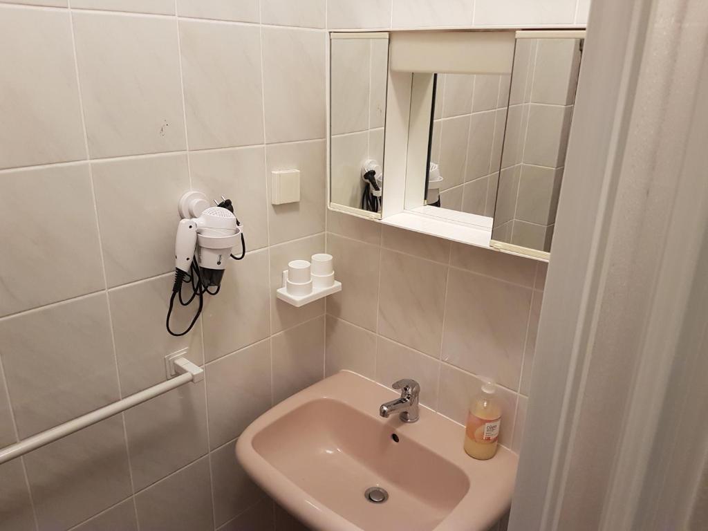 Koupelna v ubytování Apartments Zova