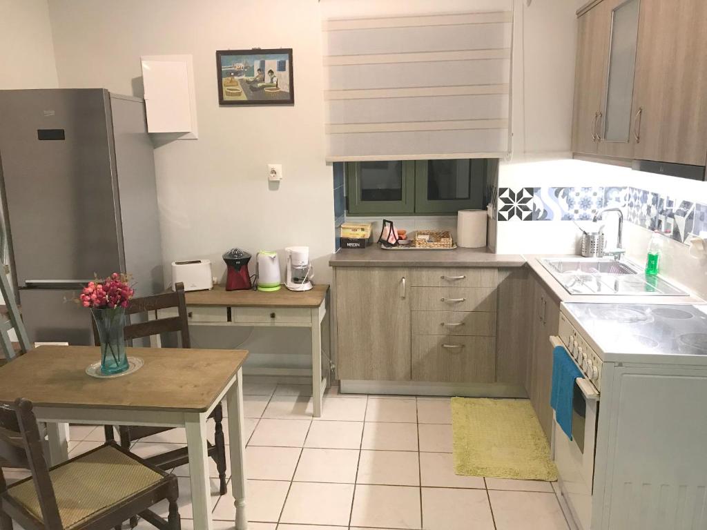 Kuchyňa alebo kuchynka v ubytovaní Odyssey Apartment