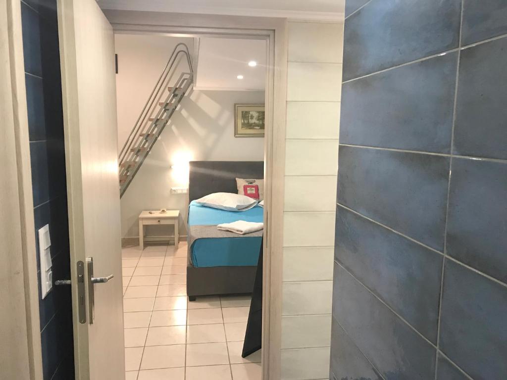 Posteľ alebo postele v izbe v ubytovaní Odyssey Apartment