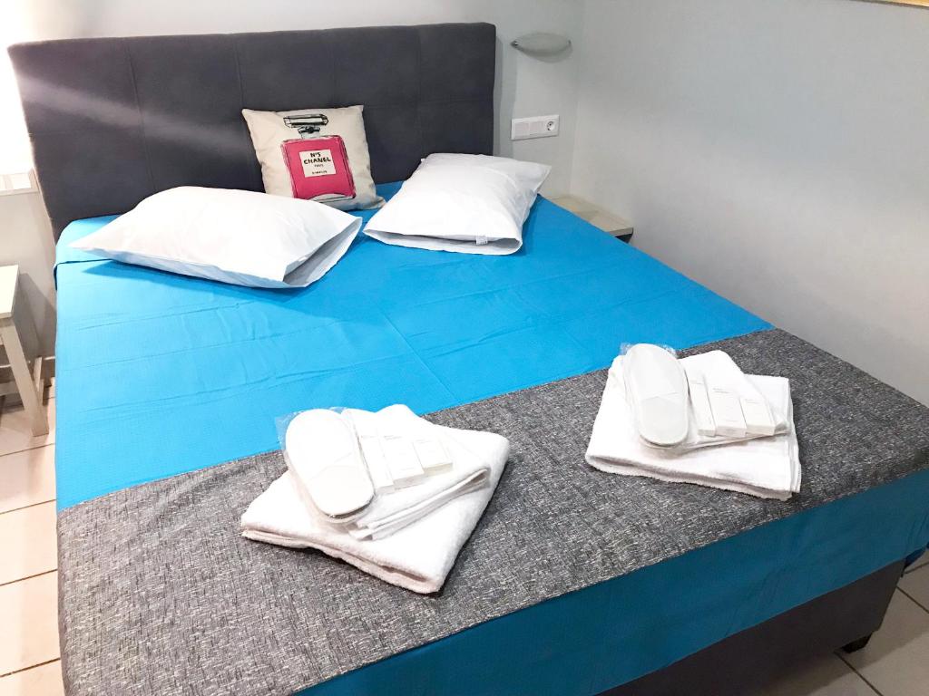 Posteľ alebo postele v izbe v ubytovaní Odyssey Apartment