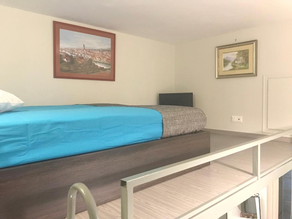 Posteľ alebo postele v izbe v ubytovaní Odyssey Apartment