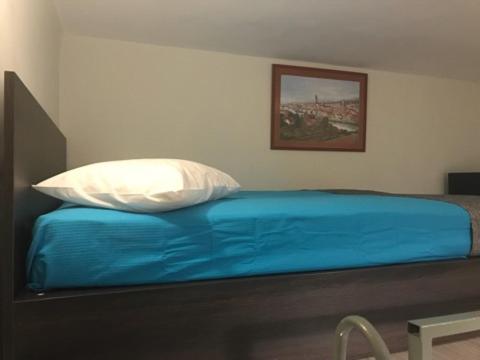 Posteľ alebo postele v izbe v ubytovaní Odyssey Apartment
