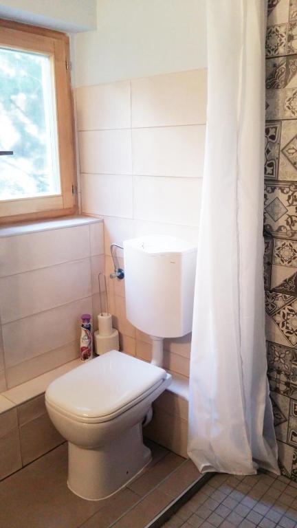 A bathroom at Home Away Apartment