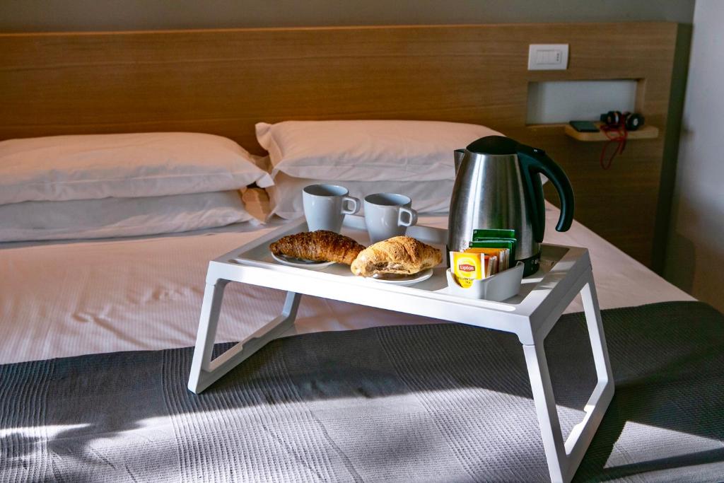Postel nebo postele na pokoji v ubytování Hotel Liane Riccione