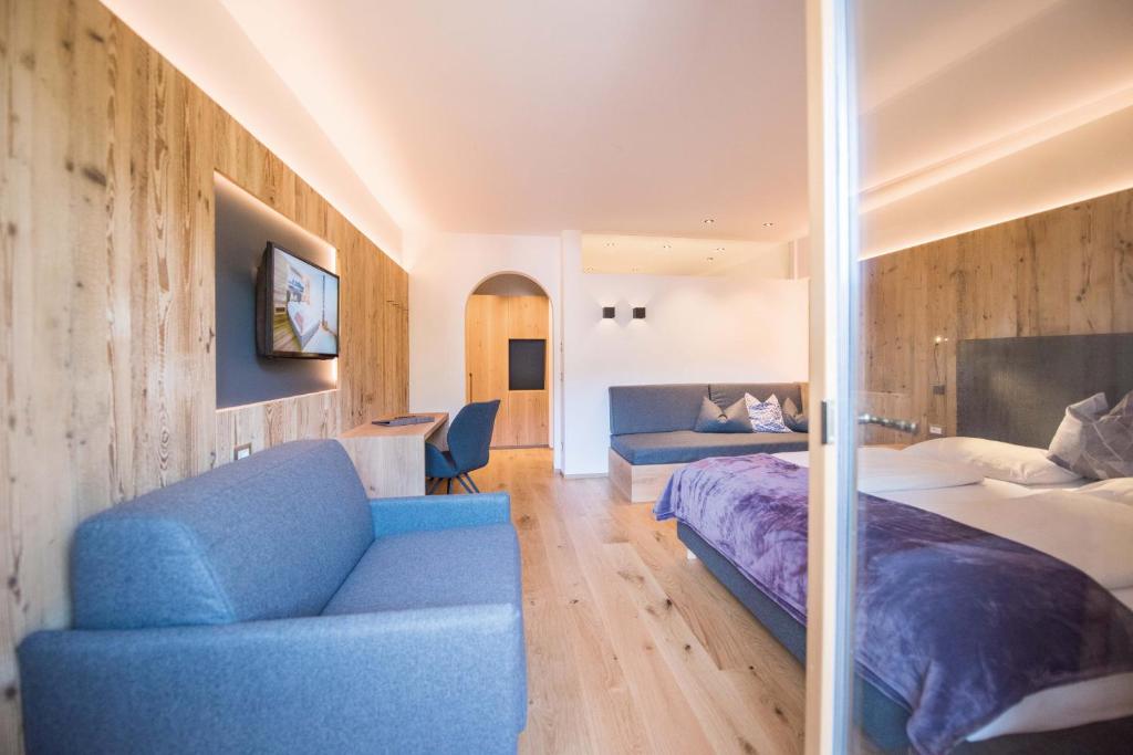 Postel nebo postele na pokoji v ubytování Hotel Kranebitt B&B