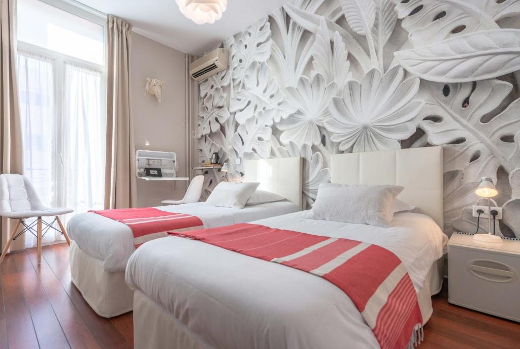 Postel nebo postele na pokoji v ubytování Hôtel Cecil - Adults only