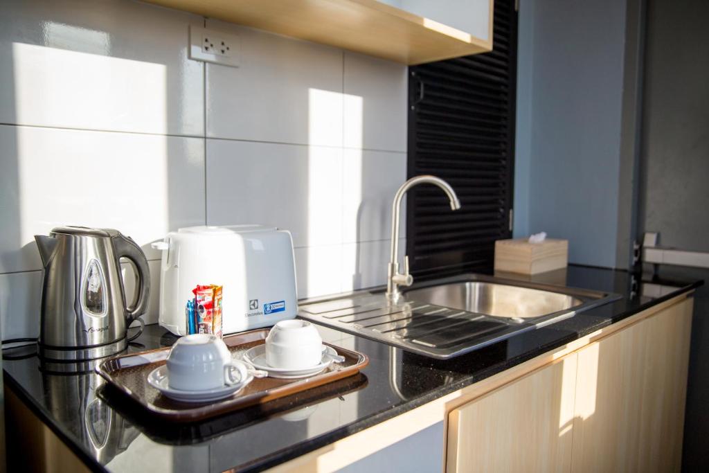Kuchyň nebo kuchyňský kout v ubytování iNest Poshtel